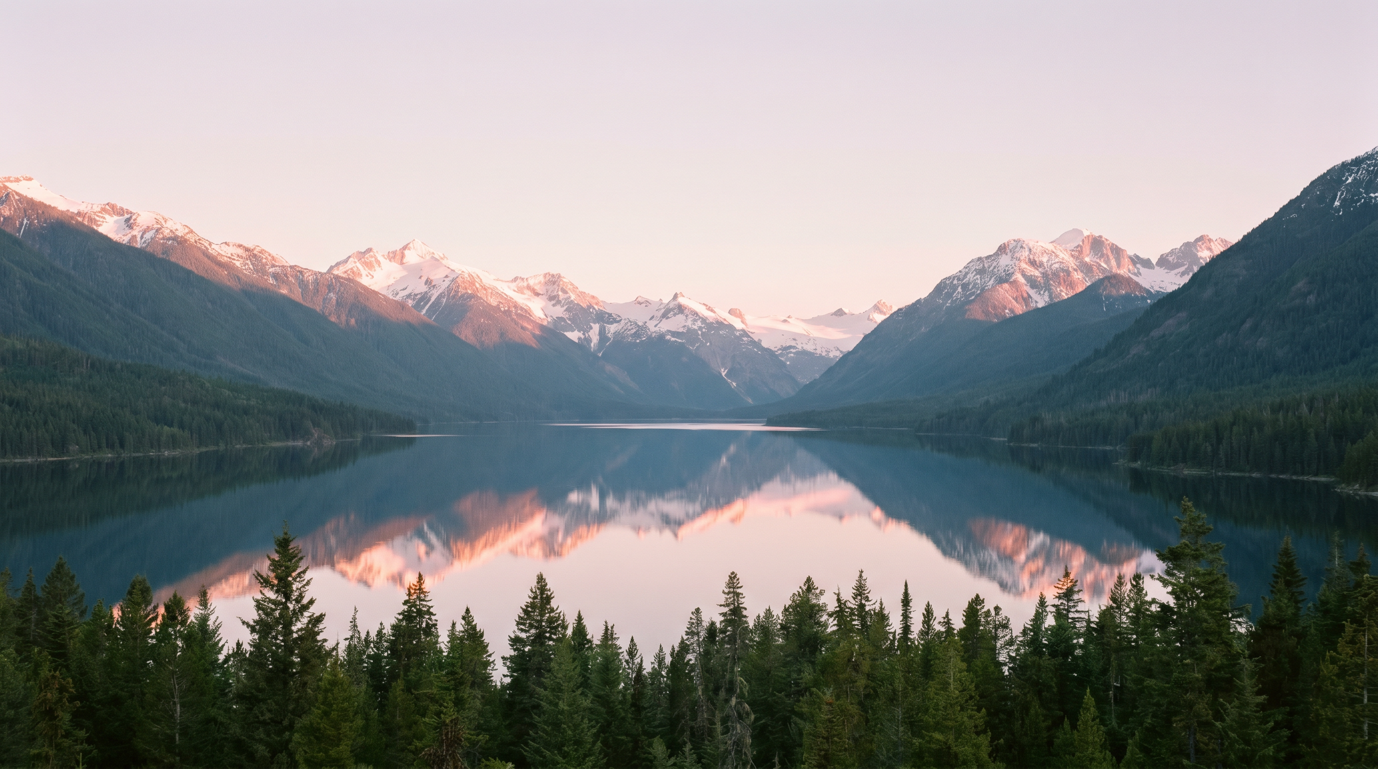 Serene mountain lake at dawn